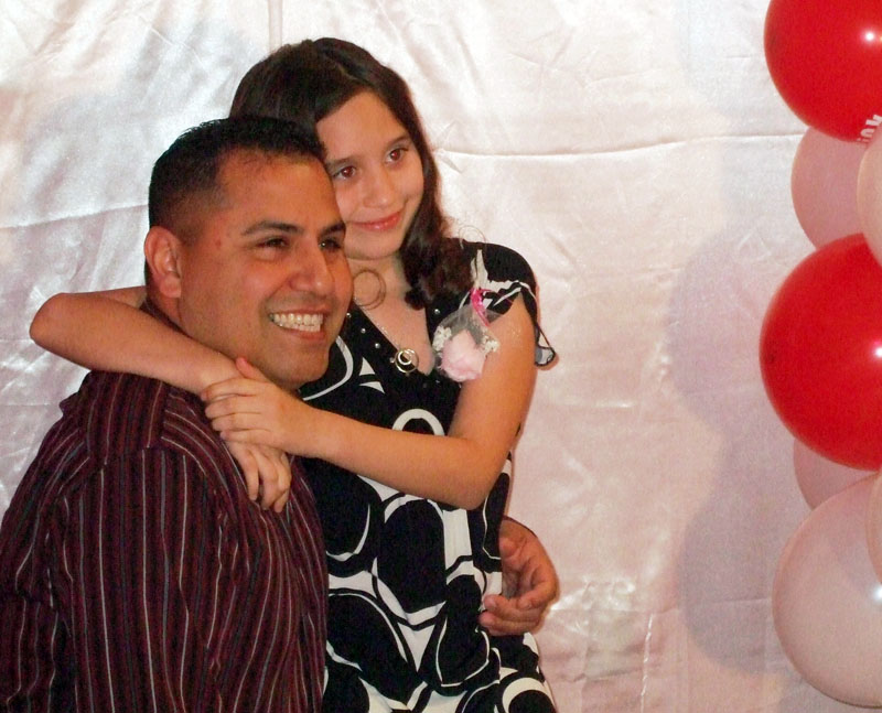 photo of a dad and daughter